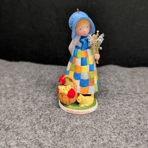 Girl Figurine with Patchwork Dress and Basket of Chicks